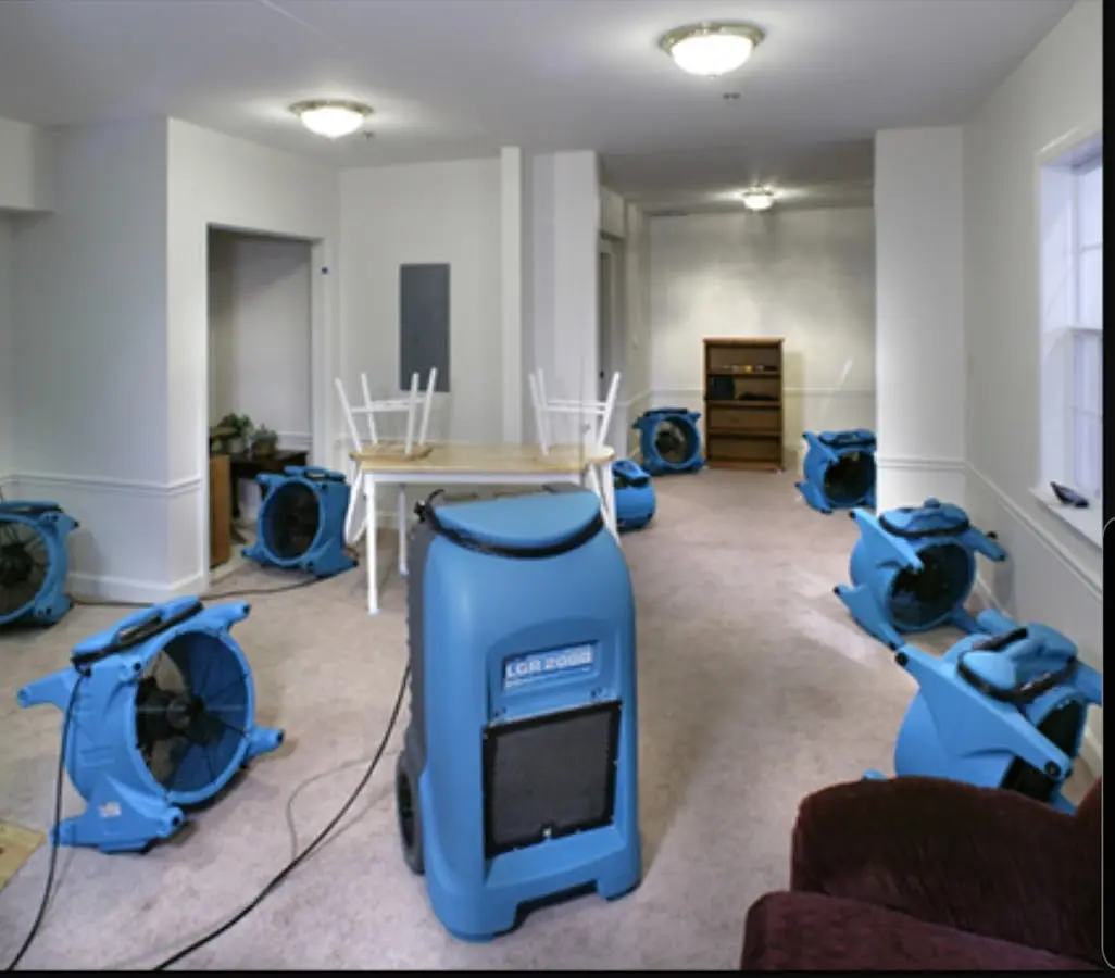 Air movers and dehumidifier setup for Water Extraction & Removal in Portales
